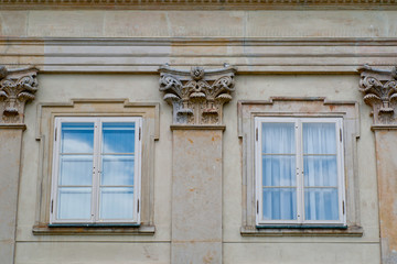 Fototapeta na wymiar Old stone wall with windows