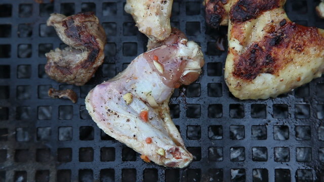 chicken meat on grill raw and roasted