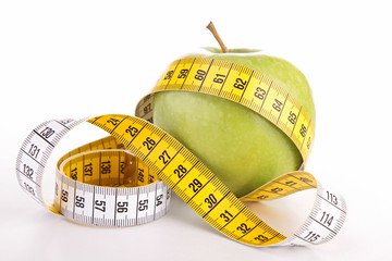 green apple and tape isolated