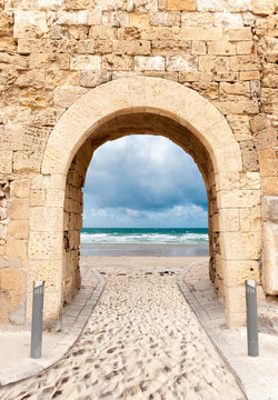 Archway leading to beach