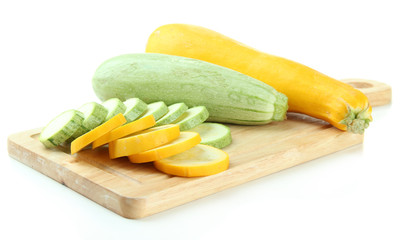 Sliced and whole raw zucchini