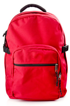 Red backpack standing on white background