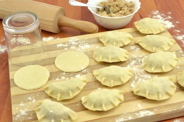 raw dumplings with sauerkraut and meat