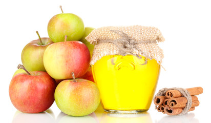 Honey and apples with cinnamon isolated on white