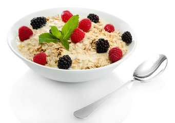 tasty oatmeal with berries, isolated on white