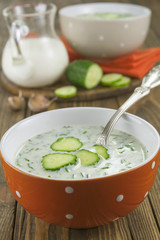 Cold soup with cucumbers, yogurt and fresh herbs