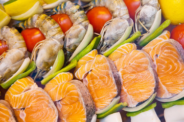 Grilled seafood on counter of buffet