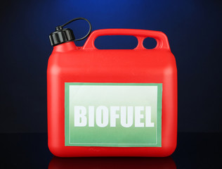 Bio fuels in canister on blue background