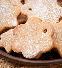 Homemade Christmas cookies sprinkled with powdered sugar