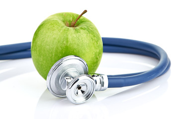 Medical stethoscope and apple isolated on white