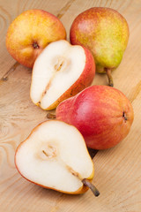 Ripe Pears on wooden background
