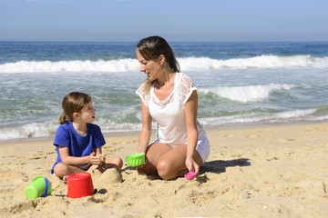 Mother and daughter on the beach