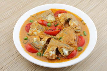 Coconut milk tomato fish curry.