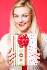 happy blond woman with a gift