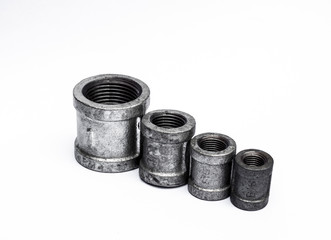 various metal fittings inner, for pipes on white