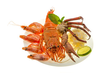 Spiny lobster, shrimps, crab legs  and rice