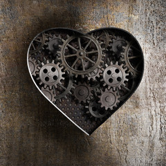 metal heart with rusty gears and cogs
