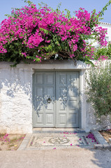 Grey gate in Spetses island, Greece