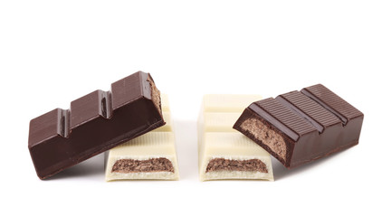 Black and white chocolate bars with filling.