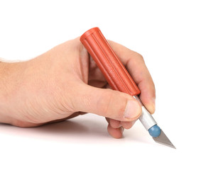 Hand holds plastic Craft Knife