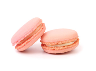 Two pink macaron cakes.