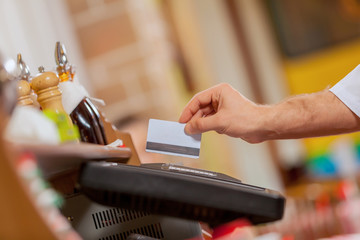 Close-up of cashier hands