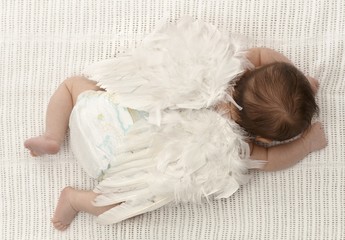 Tiny baby with angel wings
