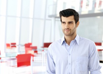 Young man in business hall