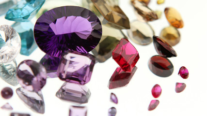 Authentic Gemstones on a mirror with reflection