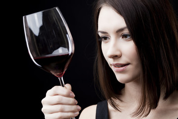 woman holding wine glass