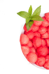 Watermelon sliced heart shape on white bacground