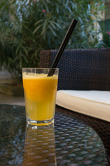 glass of fresh orange juice with black stroke