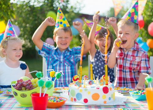 Group Of Kids Having Fun At Birthday Party