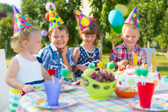 Group Of Kids Having Fun At Birthday Party