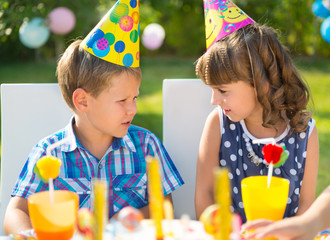 Happy children having fun at birthday party