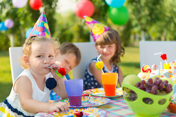 Pretty girl at child's birthday party