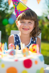 Pretty girl at child's birthday party