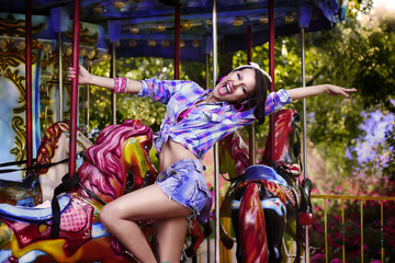 Happy Woman in Amusement Park - Fanfair. Enjoyment