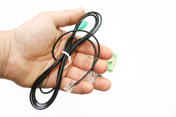 Telephone cable in a hand