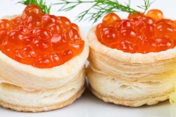 Two tartlets with red caviar
