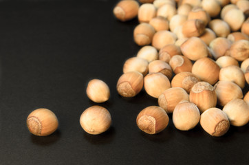 A bunch of hazelnuts isolated on black