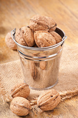 bucket with walnuts