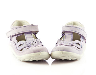 purple sandals for kids. children's shoes isolated on a white ba