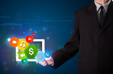 Businessman presenting colorful modern signs