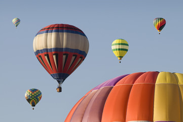 Fototapeta premium Hot-air Balloons Floating in a Blue Sky