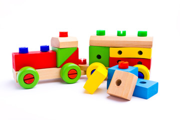 Colorful wooden toy train isolated on white background