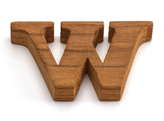 Alphabet made from wood on white