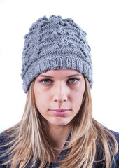 Teen girl with knit hat and cardigan