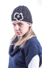 Teen girl with knit hat and cardigan