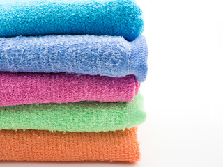Colorful towels isolated on white